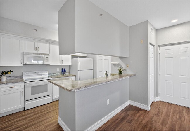 Building Photo - NOW AVAILABLE - Cozy Condo in Tuscany Gardens!