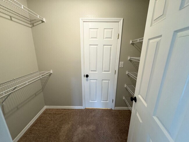 Building Photo - Lovely Winter Springs Condo ~ Vinyl Plank Flooring and Large Screened Patio!