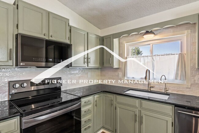 Building Photo - Updated 4 Bed, 2 Bath Home in Briargate with Mountain Views, fully fenced yard, 2 car garage and AC