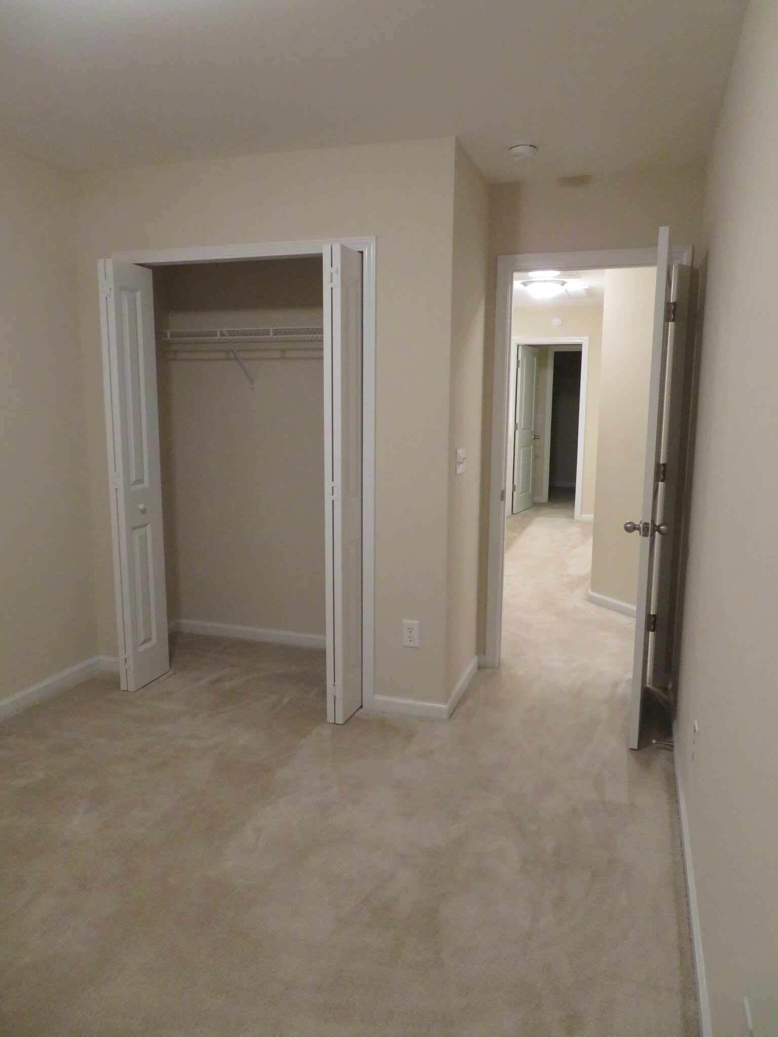 2nd Bedroom off loft, beside laundry closet. View across loft to Master Suite - 2496 Stadium Dr
