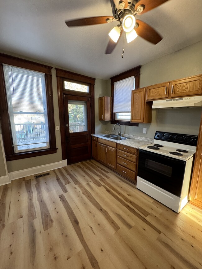 Kitchen with back door to deck - 925 Walnut St.