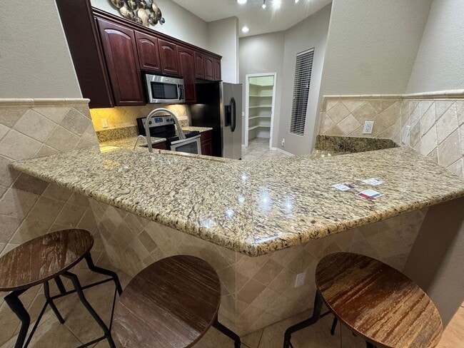 Building Photo - Furnished 3BR Laughlin Ranch Pool Home with Entertainer's Patio in gated Golf Community includes ...