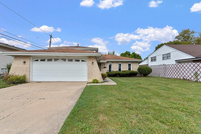 Building Photo - 1144 E 160th Pl