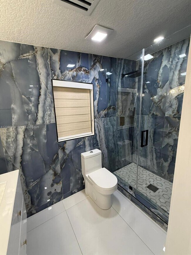 Building Photo - 10460 SW 26th Terrace