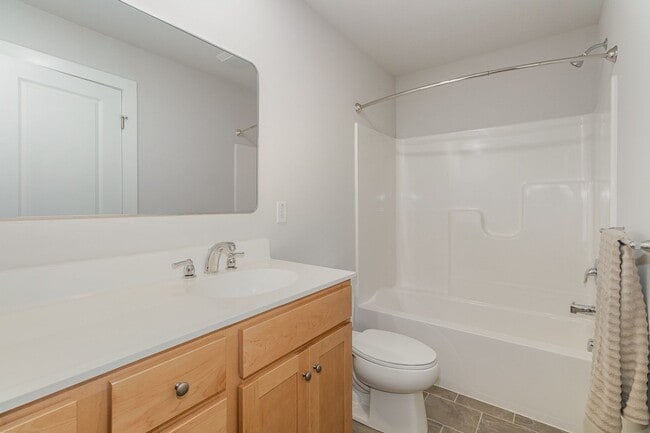 Building Photo - Modern 2025 Townhome | Open-Concept Living, Chef’s Kitchen with Large Island & 2-Car Garage