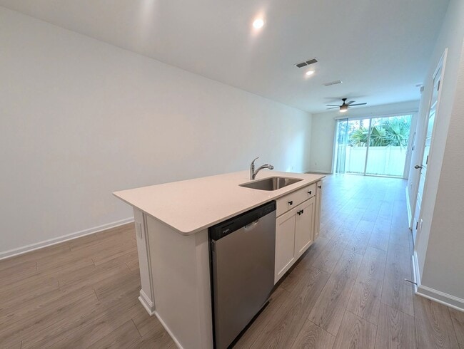 Building Photo - BRAND NEW 3 Bedroom, 2.5 Bath - End Unit - Townhome with Upgrades - located on the Westside - CLO...