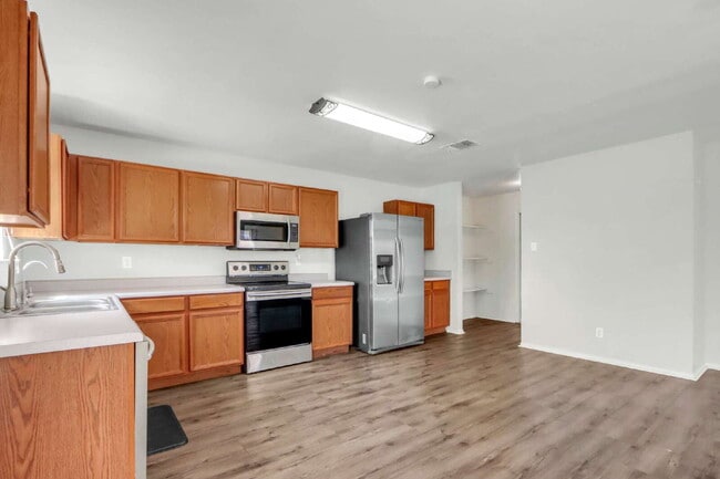 Building Photo - "Spacious 4-Bed, 3-Bath Retreat with Solar Panels!"