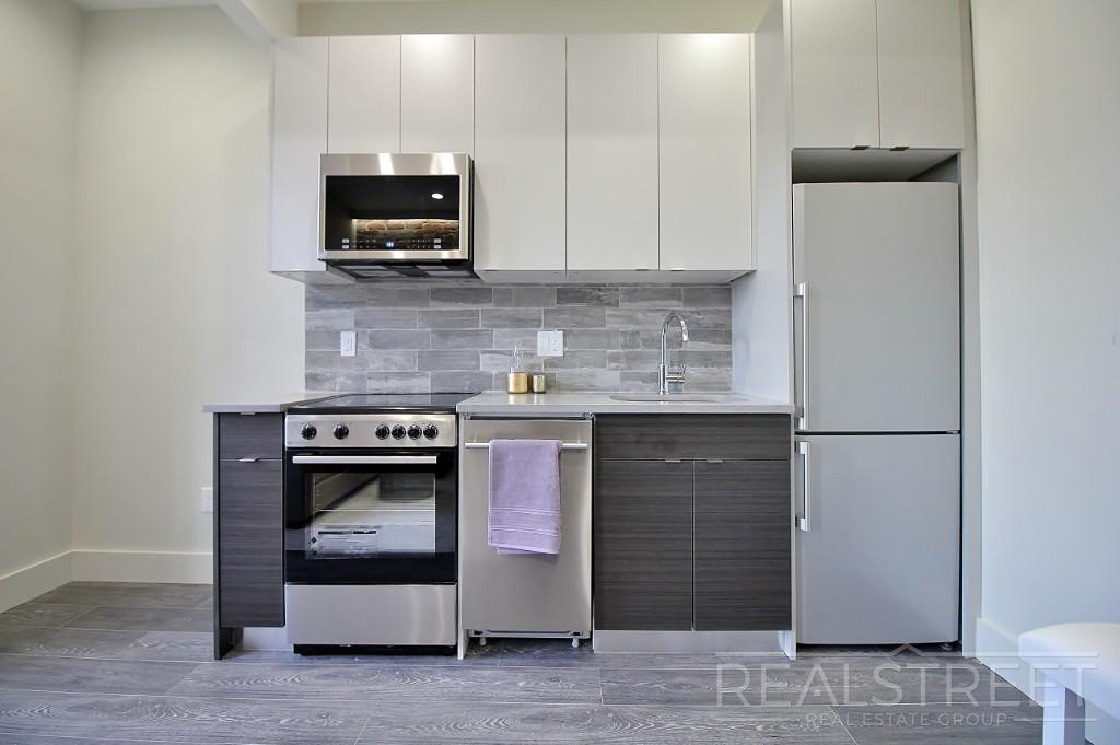 Building Photo - Stunning New 2 Bed in Crown Heights with Lounge & Backyard!