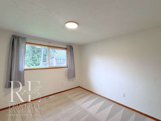 Building Photo - Bright & Spacious Single-Level Home with Dual Living Areas