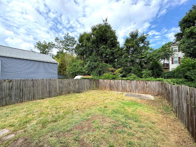 Building Photo - Charming 2BR Townhome with Finished Basement, Fenced Yard & Private Driveway Near Huntington Metro