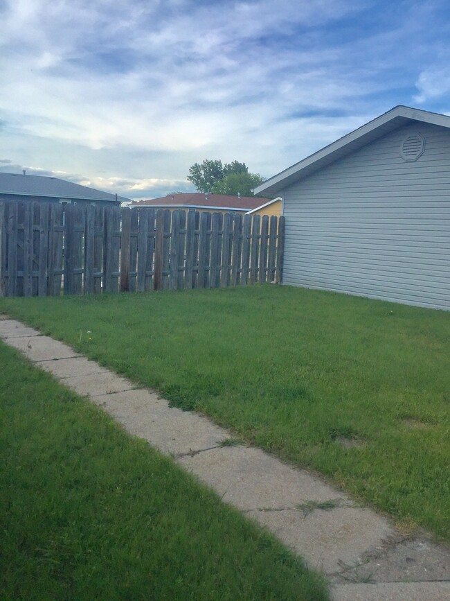 Fenced in back yard - 513 W 36th St