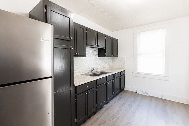Building Photo - Move-In Ready 4BR Home with Large Backyard