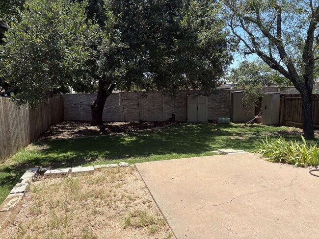 Building Photo - Updated 4-Bedroom 2 Bathroom Austin Home with Beautiful Backyard