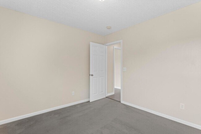 Building Photo - House with Fenced Back Yard Available!