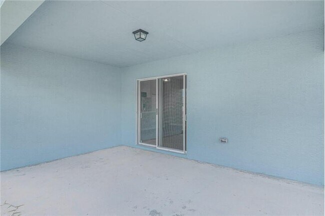 Building Photo - 1690 SW Morelia Ln