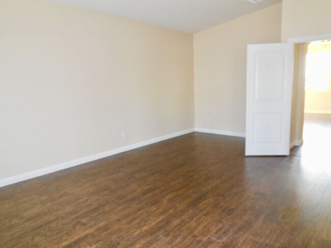 Building Photo - Spacious House w/Tons of Storage,Tile & Wo...