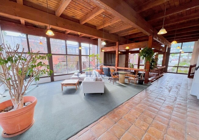 Building Photo - Stylish Condo with Pool, Fitness Center & ...