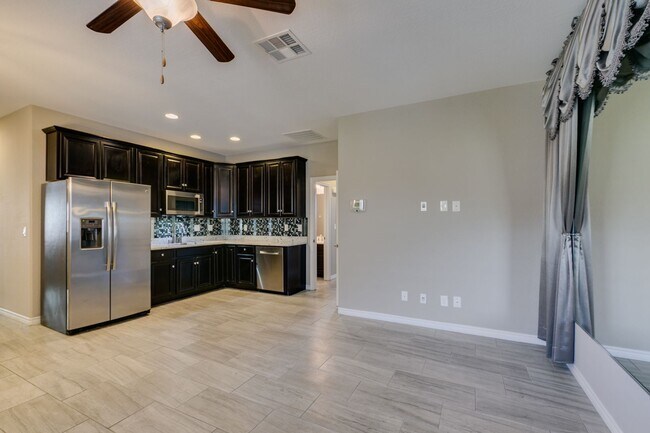 Building Photo - Beautiful Next-Gen Home with Private Entry Suite & Spacious Backyard