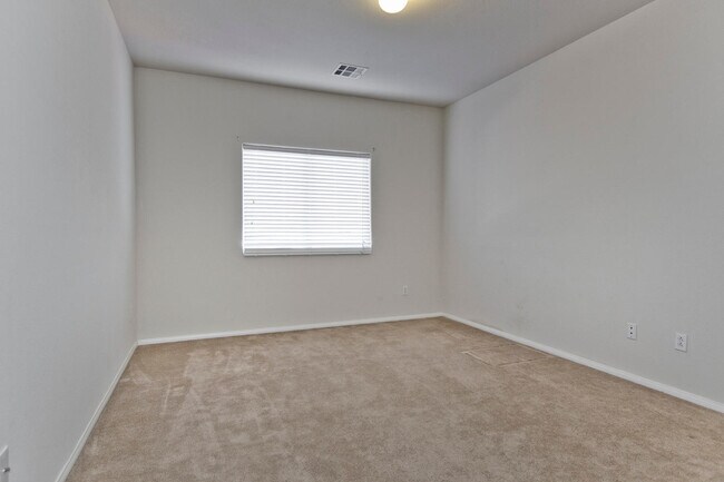 Building Photo - THIS 2 STORY HOME IN A GATED COMMUNITY HAS...