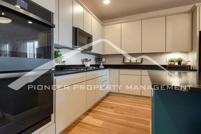 Building Photo - Stylish Main-Level Living with Finished Ba...