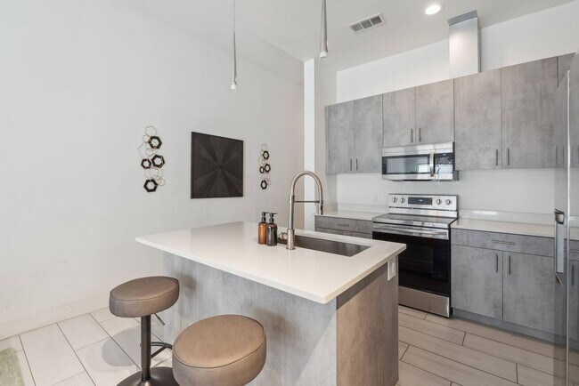 Building Photo - Luxury 1 Bedroom + Flex Space | 2 Full Baths | 975 Sq. Ft. | The Cedars, Dallas