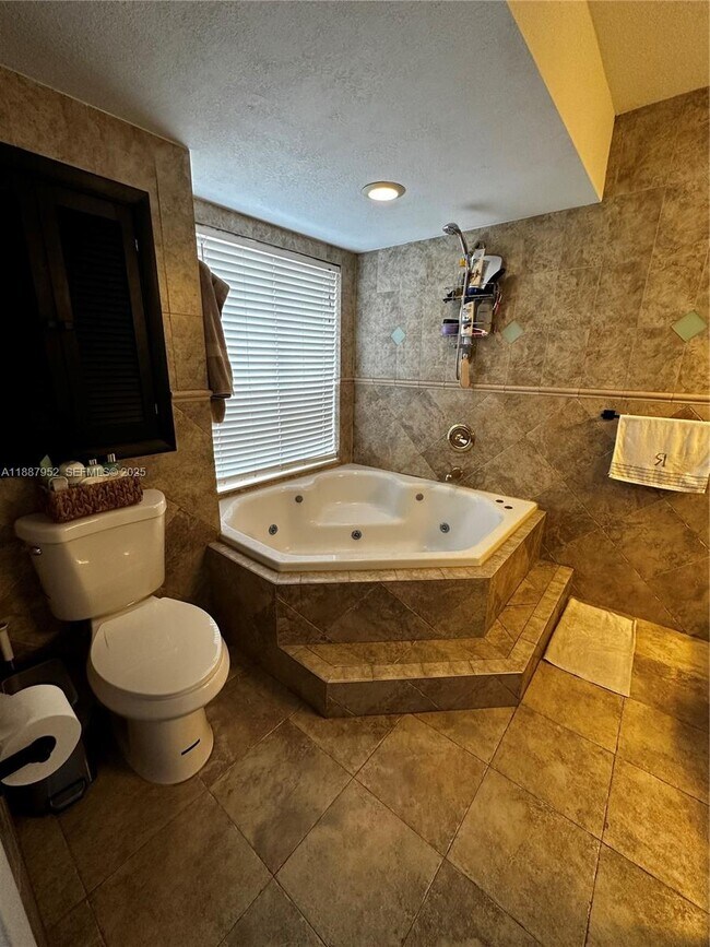 Building Photo - 3971 Coral Springs Dr