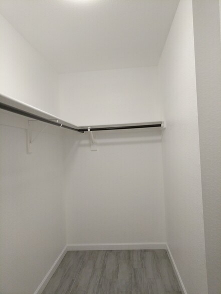 Master Bedroom - Walk in Closet. North Wall - 14101 N 78th Dr