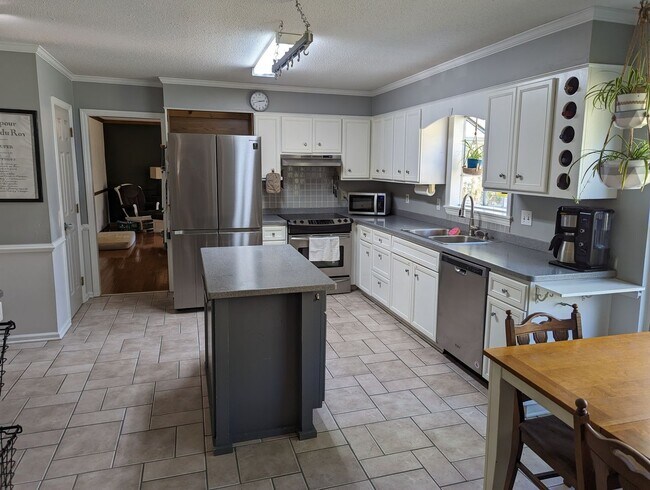 Building Photo - Spacious 4BR in Evans with Garage, Large Backyard, and Deck