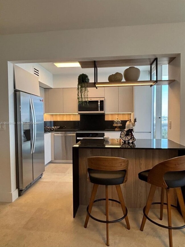 Building Photo - 6301 Collins Ave