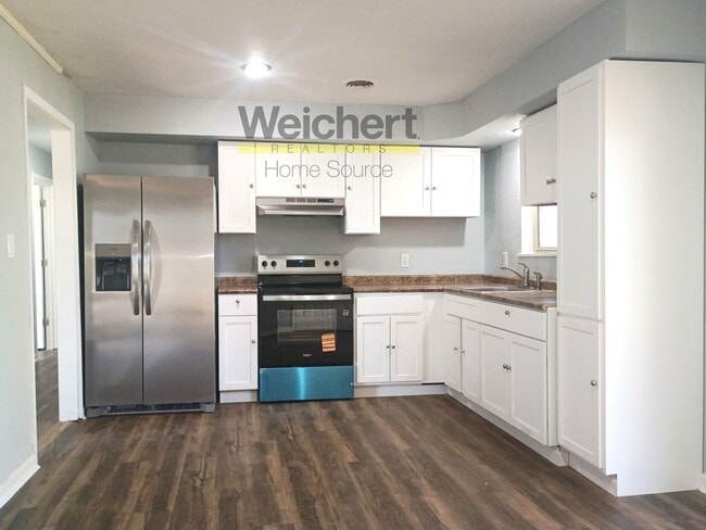 Building Photo - Spacious 4 Bedroom, Fully Updated & Move-In Ready!