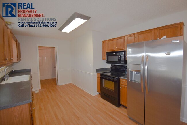 Building Photo - 3BR/2BA south Mboro 2-car garage, fenced backyard with brand new patio!