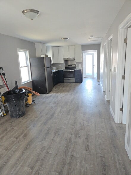 View of Kitchen/ Living Room from front door to back door. - 1025 Ohio St