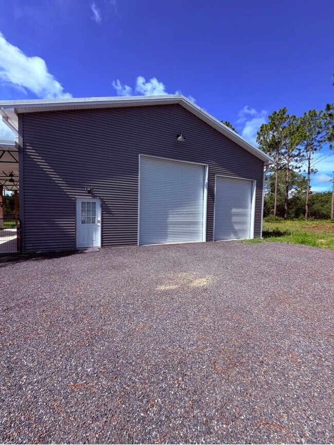 Building Photo - Gated 10-Acre Luxury Retreat with 40x60 Shop & Barn!