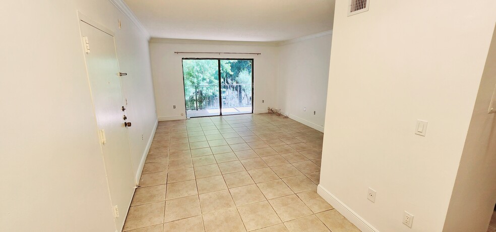 Living Room and Balcony - 10403 N Kendall Dr
