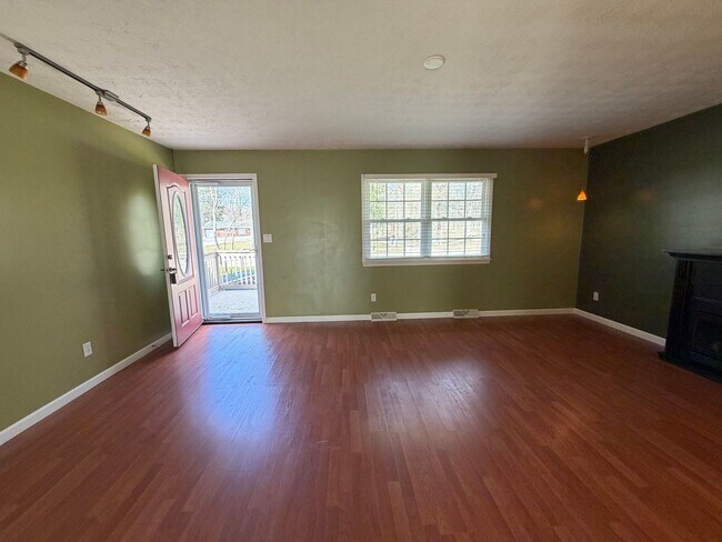 Building Photo - Goodyear Heights Gem with Fireplace, Attached Garage & Massive Backyard