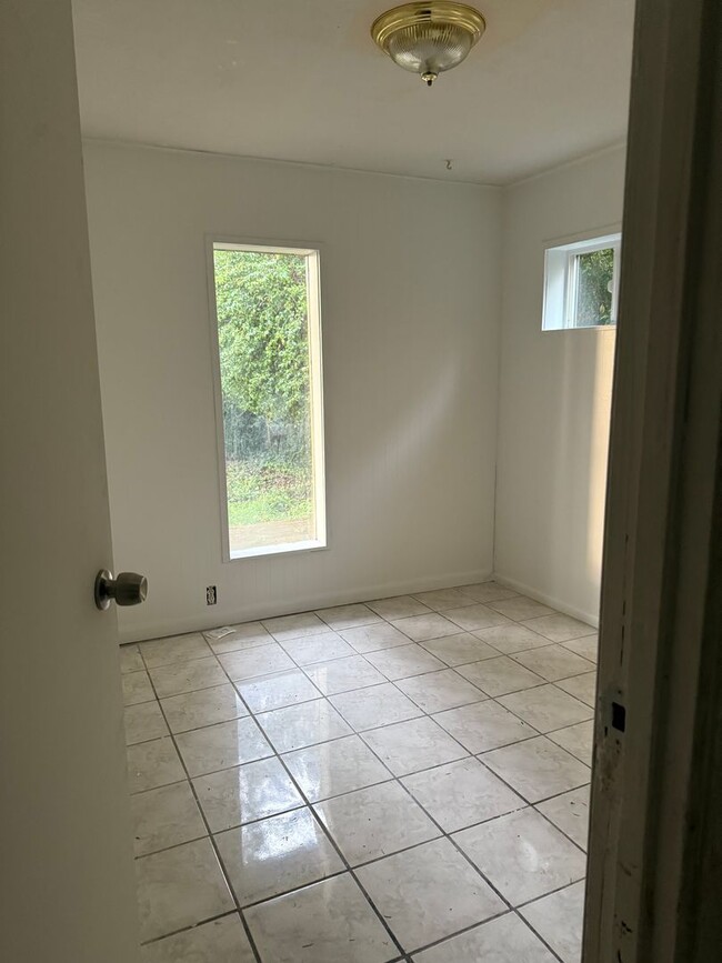 Building Photo - Spacious Two-Story with Country Kitchen and Low-Maintenance Yard