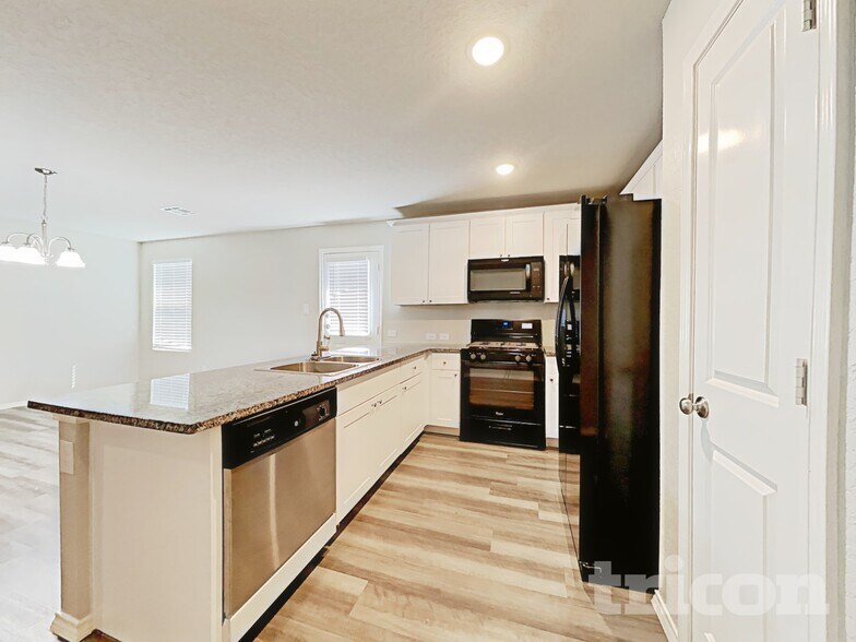 Building Photo - 6542 Augustus Magee