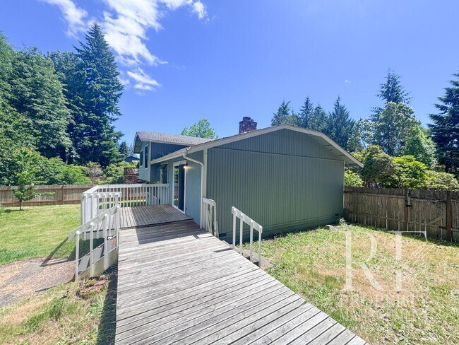 Building Photo - Spacious Poulsbo Home with Large Basement, Fenced Yard & Garden Space