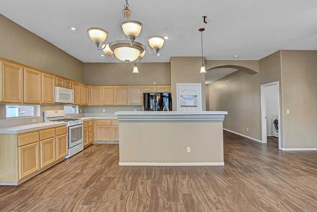 Building Photo - Gorgeous NW Single Story! 3 Car Garage! Serene Backyard.