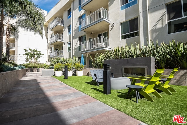 Outdoor fire place community space - 12655 Bluff Creek Dr