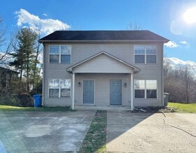 Building Photo - COMING SOON! Beautiful Townhouse! All Electric, Off-Street Parking, Washer/Dryer