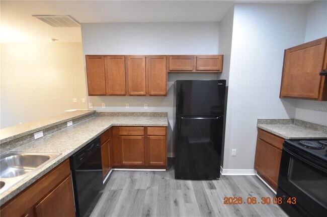 Building Photo - 8319 King Blossom Ct