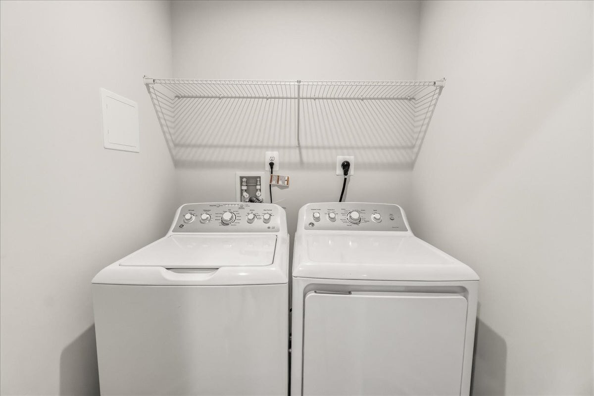 Washer & Dryer on bedroom floor - 1403 Wilmer Park Ln