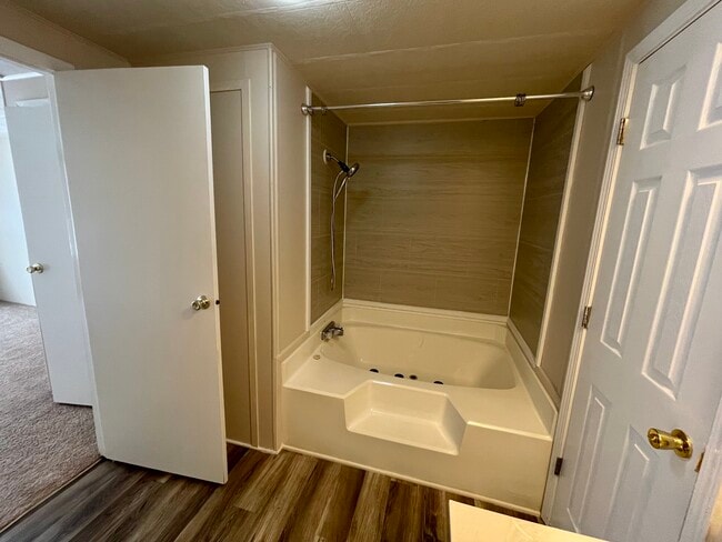 Master Bath with new surround - 311 Rugby Rd