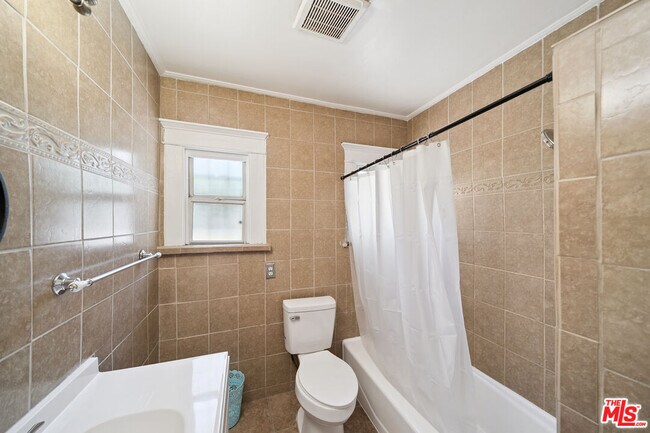 Building Photo - 1165 W 38th St