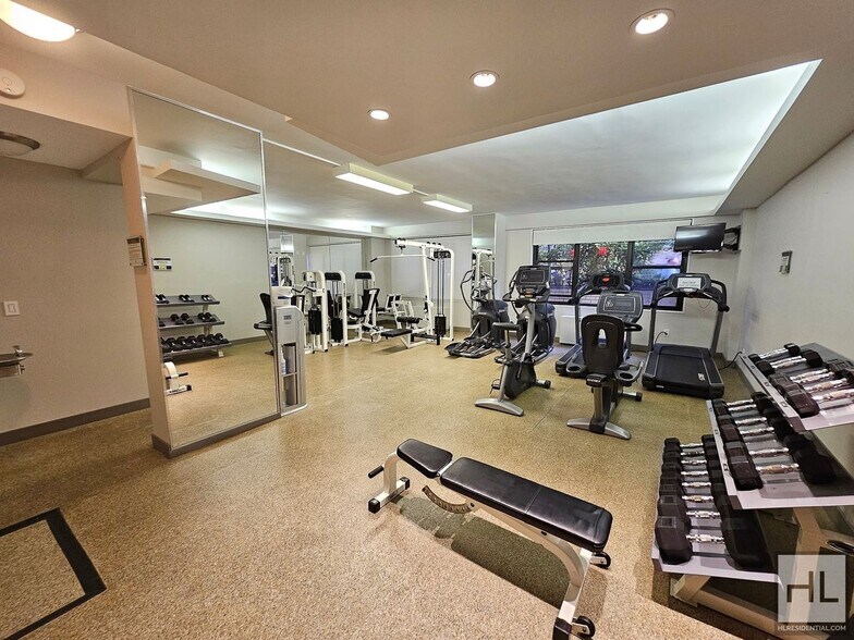 Building Photo - Corner 1-Bedroom in Midtown East | 11th Floor, Full-Service Building