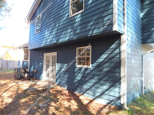 Building Photo - 7153 Woodland Cir