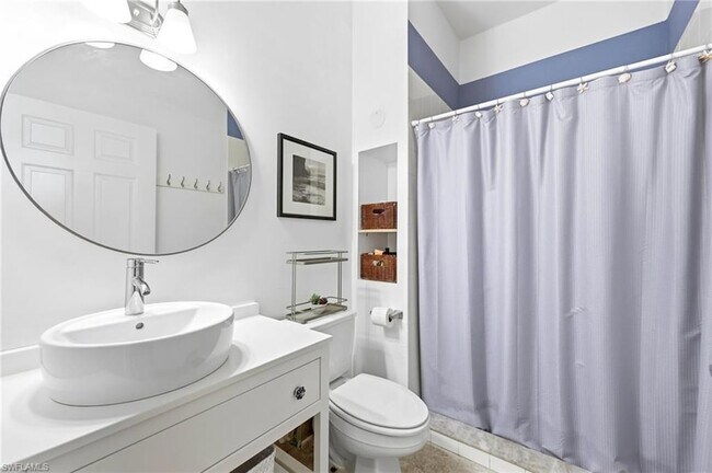 Building Photo - 25000 Tamiami Trl E