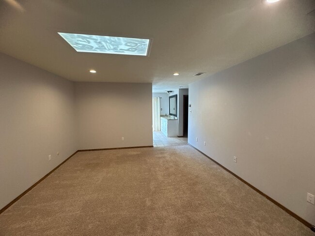 Building Photo - Two-story, four-bedroom, three-bathroom ho...