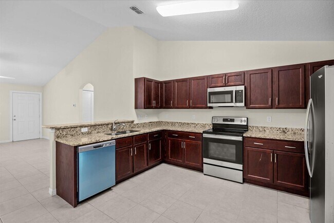 Building Photo - 8736 98th Ct